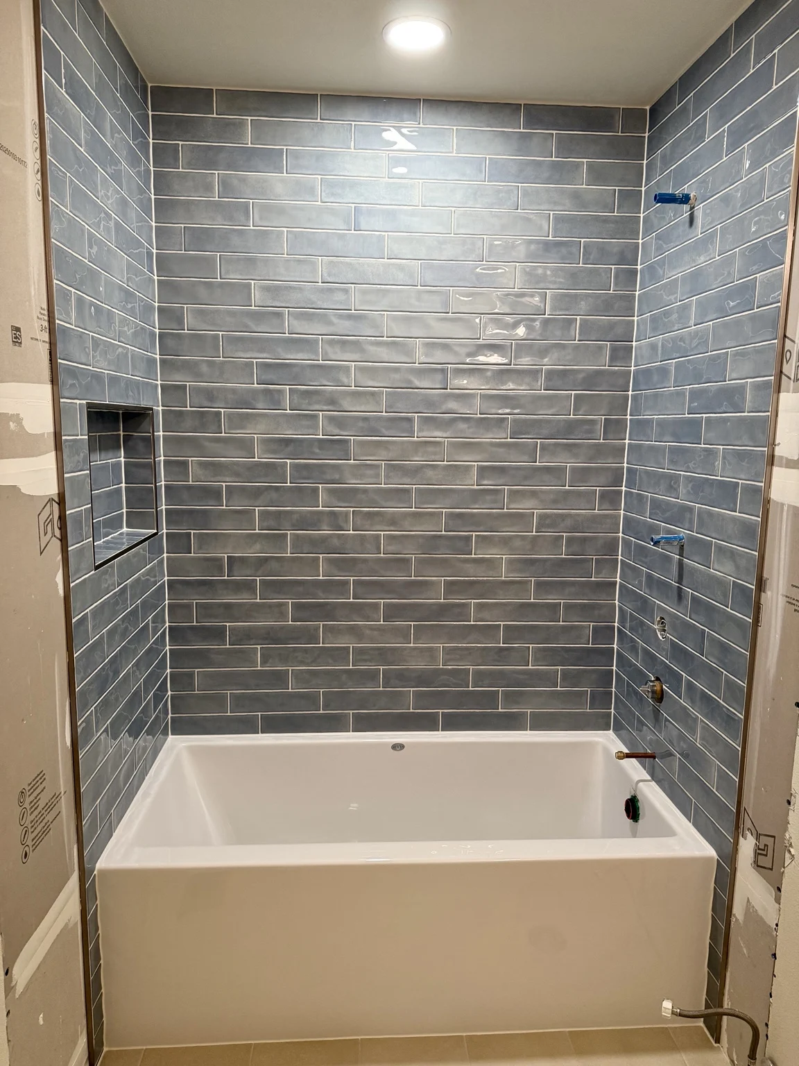 Blue-gray tile tub surround